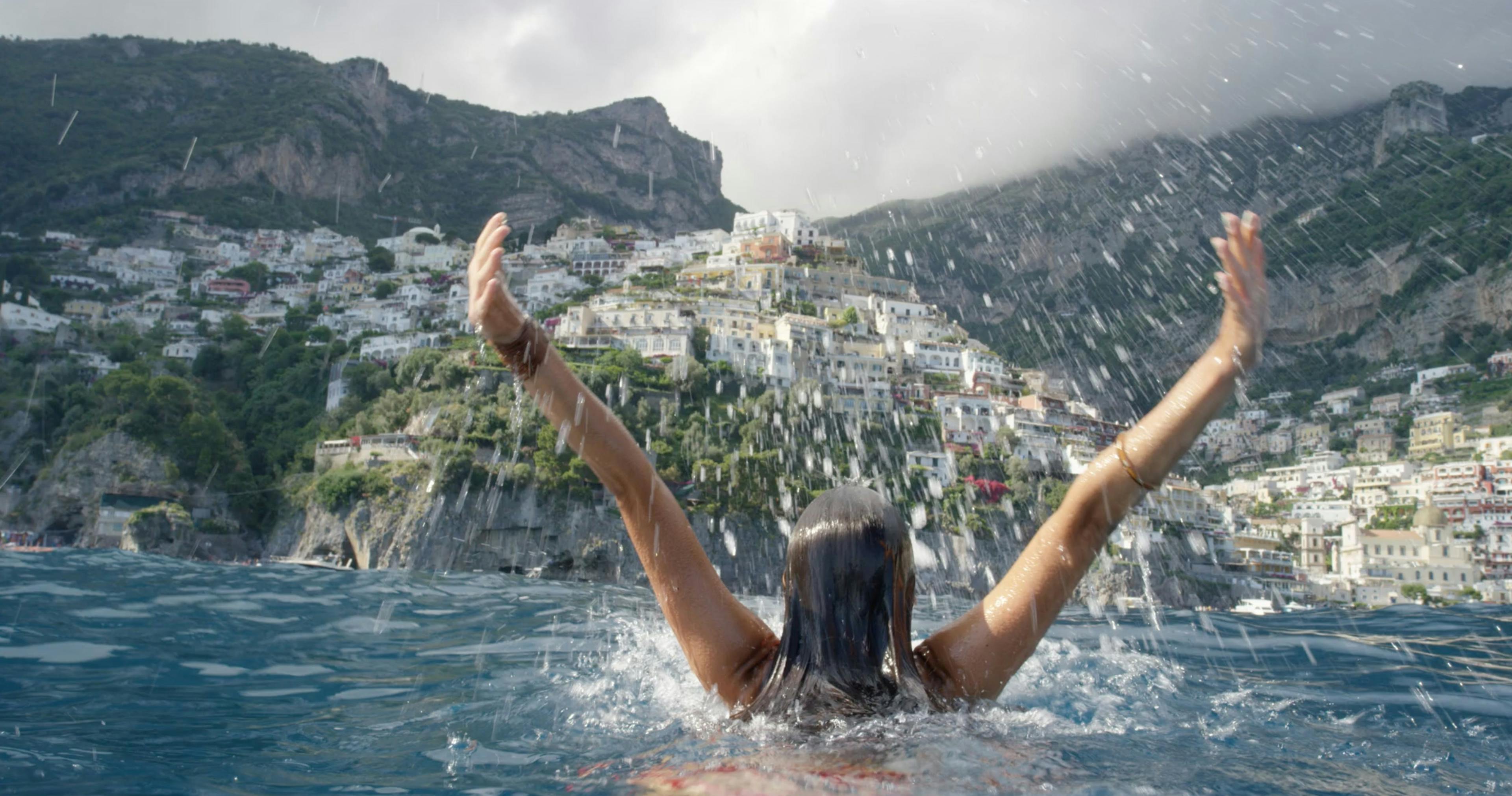 the Amalfi coast with swimmer